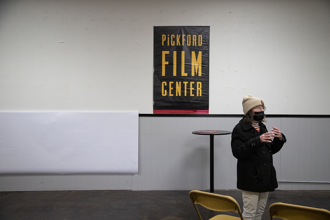 Susie Purves, executive director of the Pickford Film Center, stands in the currently-vacant commercial space off of Grand Avenue in Bellingham on Friday, Dec. 10, 2021. The space will be the Pickford's new three-theater venue.