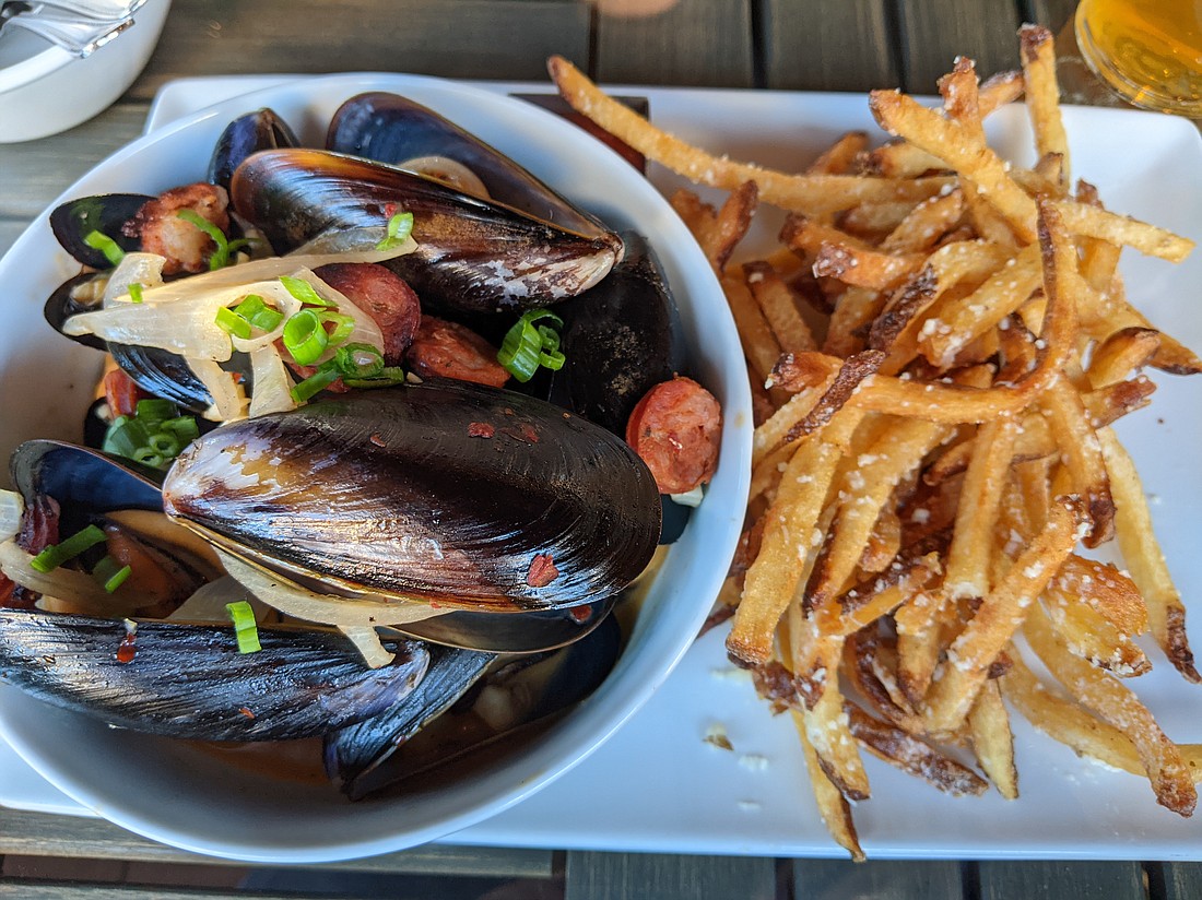 Moules frites have been a standby on the menu since the restaurant first opened. The pllump mussels are served in a rich chorizo-studded broth so good you may want to drink it all, with crispy truffle fries.