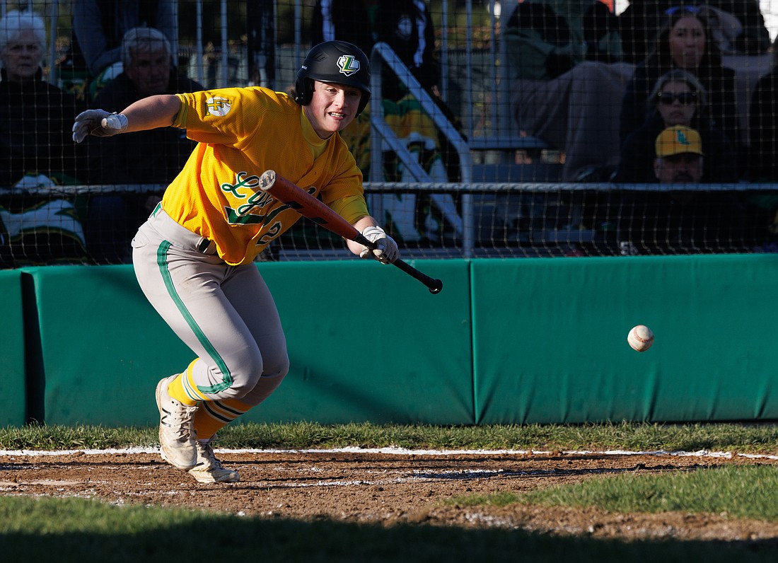 Lynden's  Campbell Nolte lays down a bunt as Meridian beat Lynden 4-3 in a game in late March.