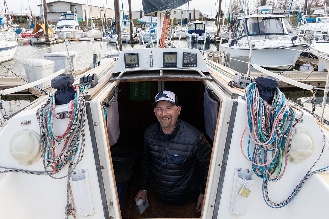 Dave Klingbiel stands in the cockpit of his sailboat "Rubicon" on April 9. He will race in the Corinthian Yacht Club's first race of the season.