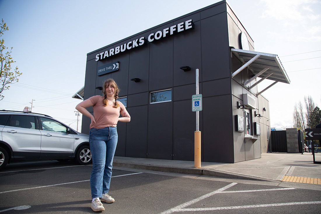 Barista Shannon Butler stands outside the Starbucks on Iowa and King streets where she and other baristas are unionizing.