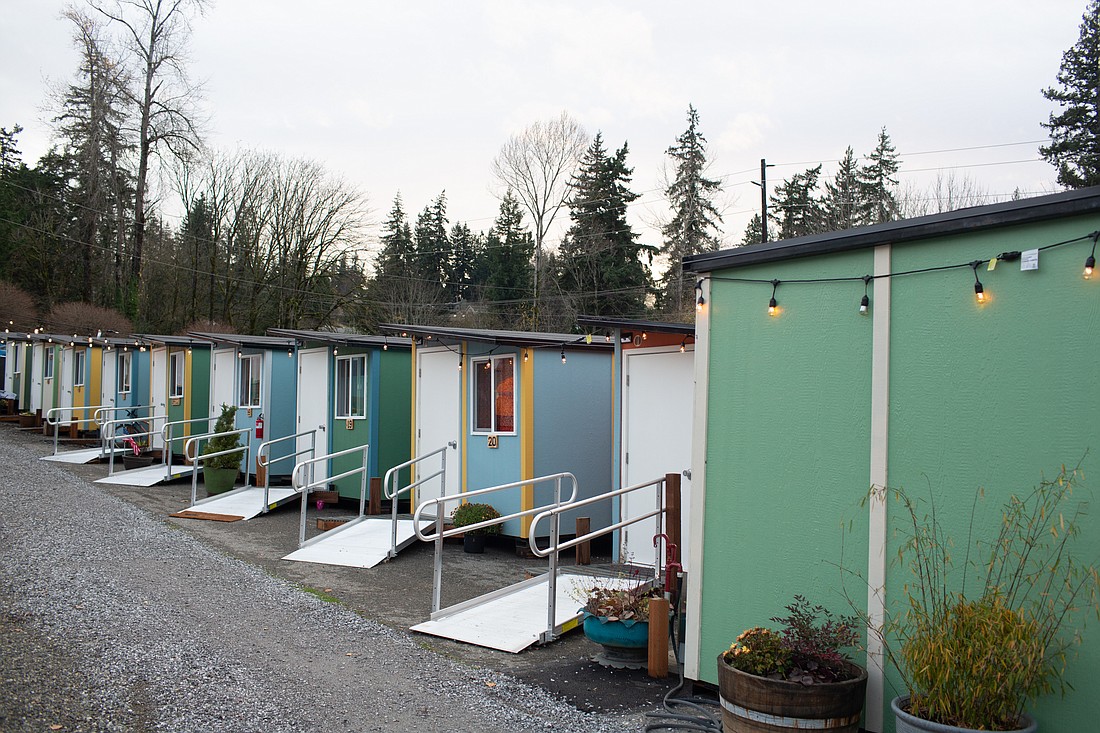 The Gardenview Tiny Home Village, home to as many as 50 people, stands on the ground of the city's former Clean Green facility at Woburn Street and Lakeway Drive.