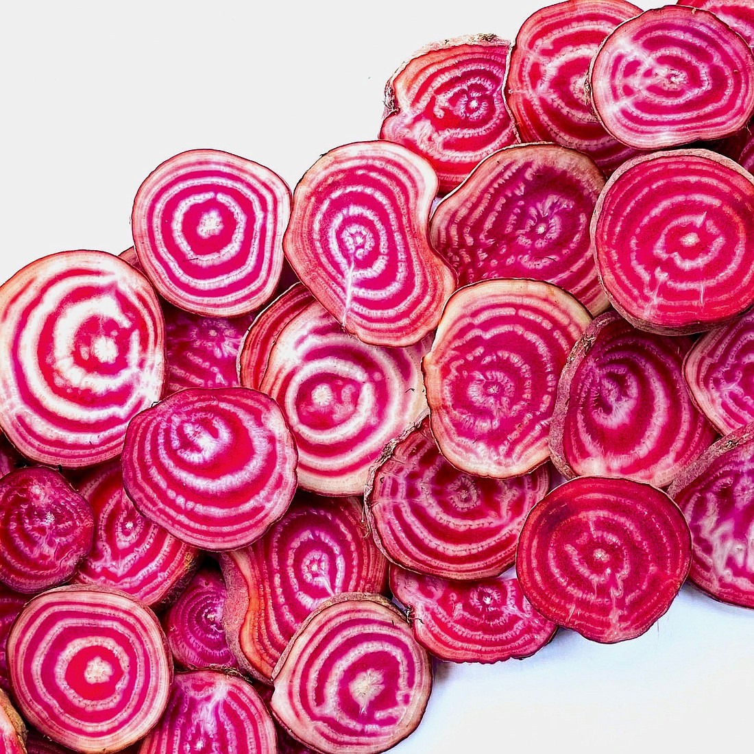 This month's root-to-leaf recipe showcases the stunning Chioggia beet, which has, improbably, concentric circles of pink and white flesh. Roasted whole, the beets become tender while retaining their colors.