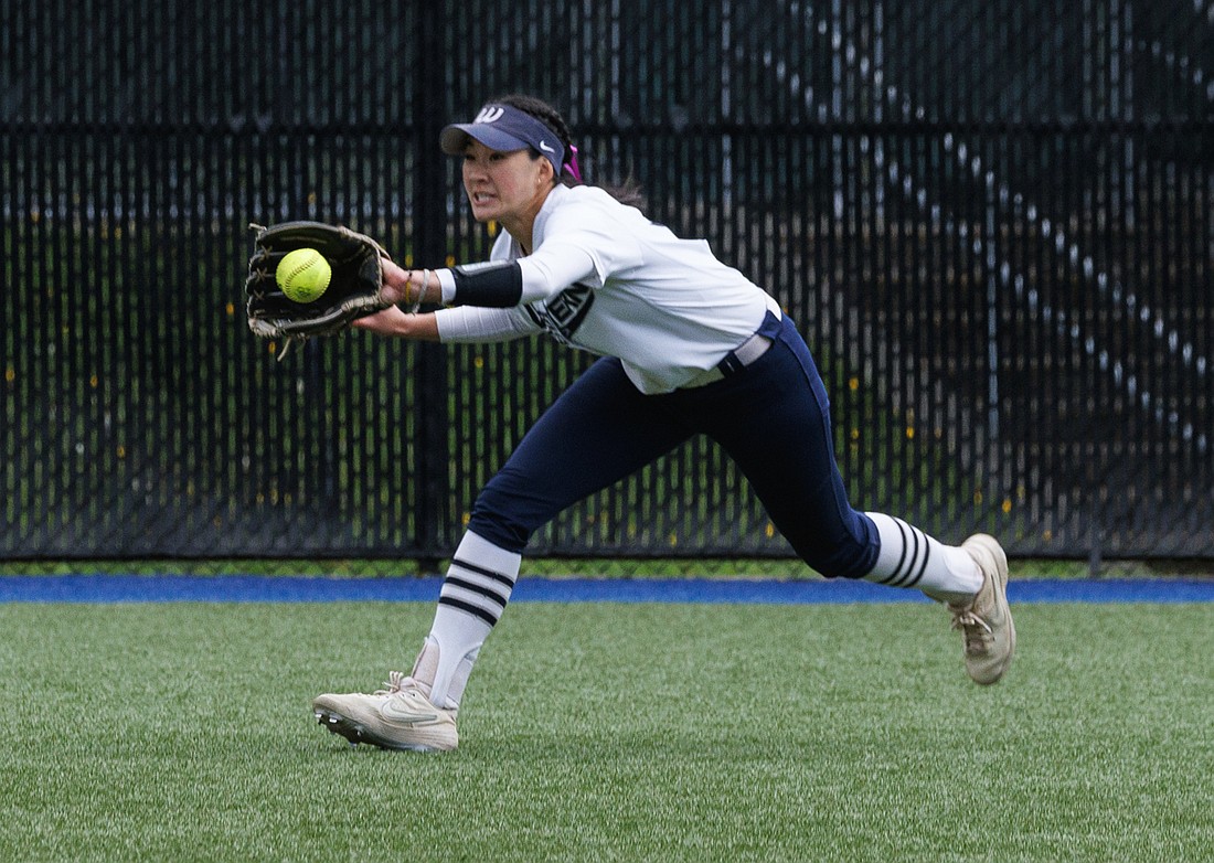 Western Washington University’s Lauren Lo makes a running catch in the outfield as the Vikings took on Saint Martin’s during a game on April 29.