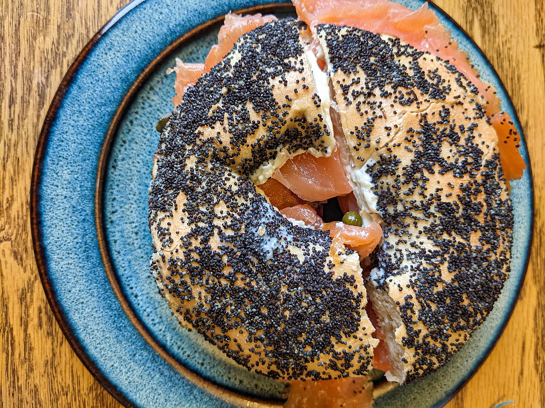 At the Whidbey Island Bagel Factory in Mount Vernon, bagel breakfast sandwiches include the breakfast lox sandwich, pictured here with a poppyseed bagel. Other options include corned beef with egg, Swiss cheese and grilled onions and a pesto egg avocado sandwich.
