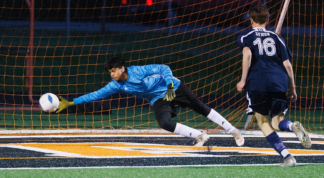 Meridian's Alejandro Santana nearly gets a hand on the ball as the Lyncs score a goal. Lynden Christian beat Meridian 3-1 at Blaine High School on May 7.