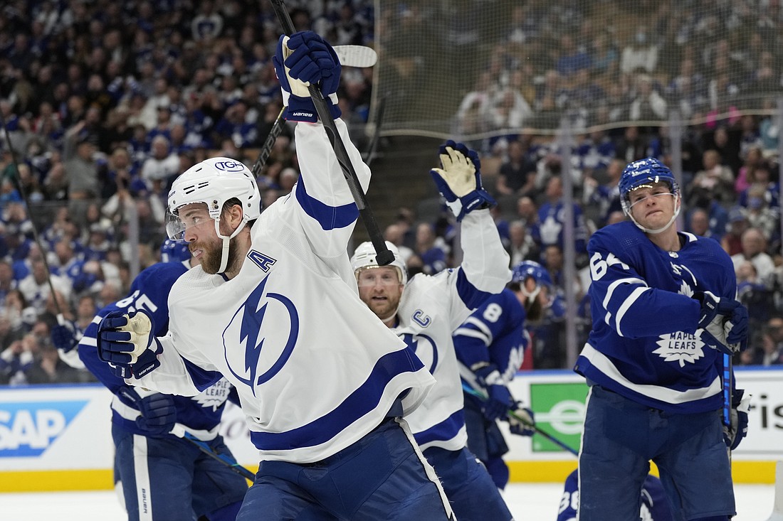 Tampa Bay Lightning defenseman Victor Hedman (77) celebrates his goal against the Toronto Maple Leafs with center Steven Stamkos (91) during the first period of Game 2 of an NHL hockey Stanley Cup playoffs first-round series Wednesday, May 4, 2022, in Toronto.