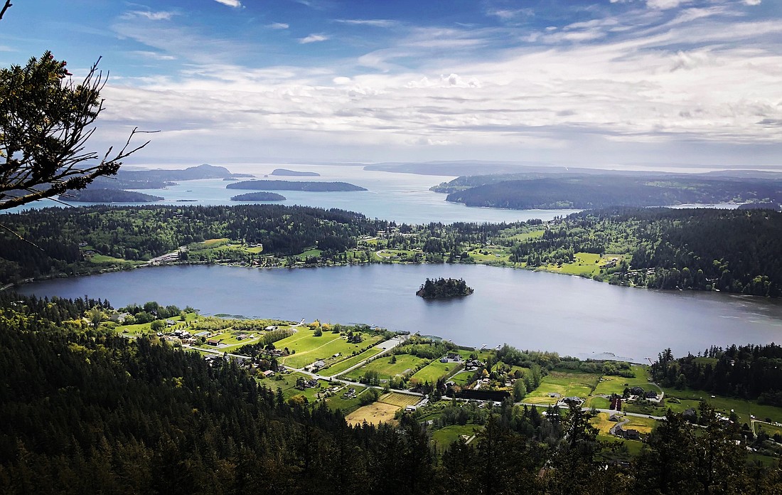 The popular vista atop Mount Erie, Fidalgo Island’s highest point at 1,273 feet, looks out at Lake Campbell and the various islands in Skagit Bay near Whidbey Island.