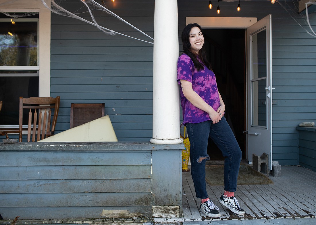 Natalie Vinh stands on the front deck of Bluebird — a popular local venue for house shows in Bellingham. Managed entirely by Vinh, Breakout Magazine is a collaborative online music magazine that aims to cover bands and artists who are just breaking out, often playing house shows at venues like Bluebird.