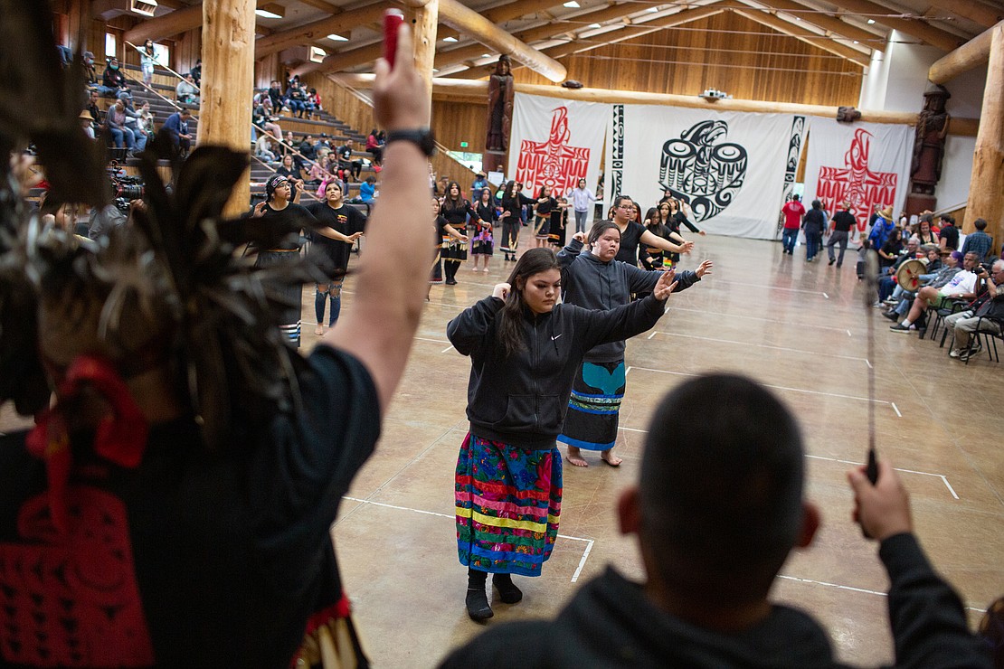 The West Shore Canoe Family from the Lummi Nation dances to the steady drum beats during the Coastal Jam at the Wex'liem Community Building on May 27.