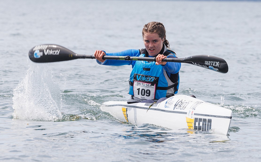 Kayaker Ana Swetish of The Real Housewives of Whatcom County keeps an eye on the shore as she rows to the finish line.