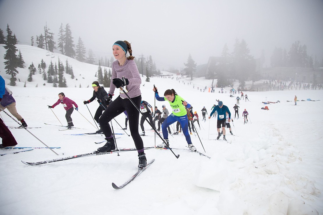Elizabeth Watters from The Lost Canoe climbs a hill in the cross-country ski leg.