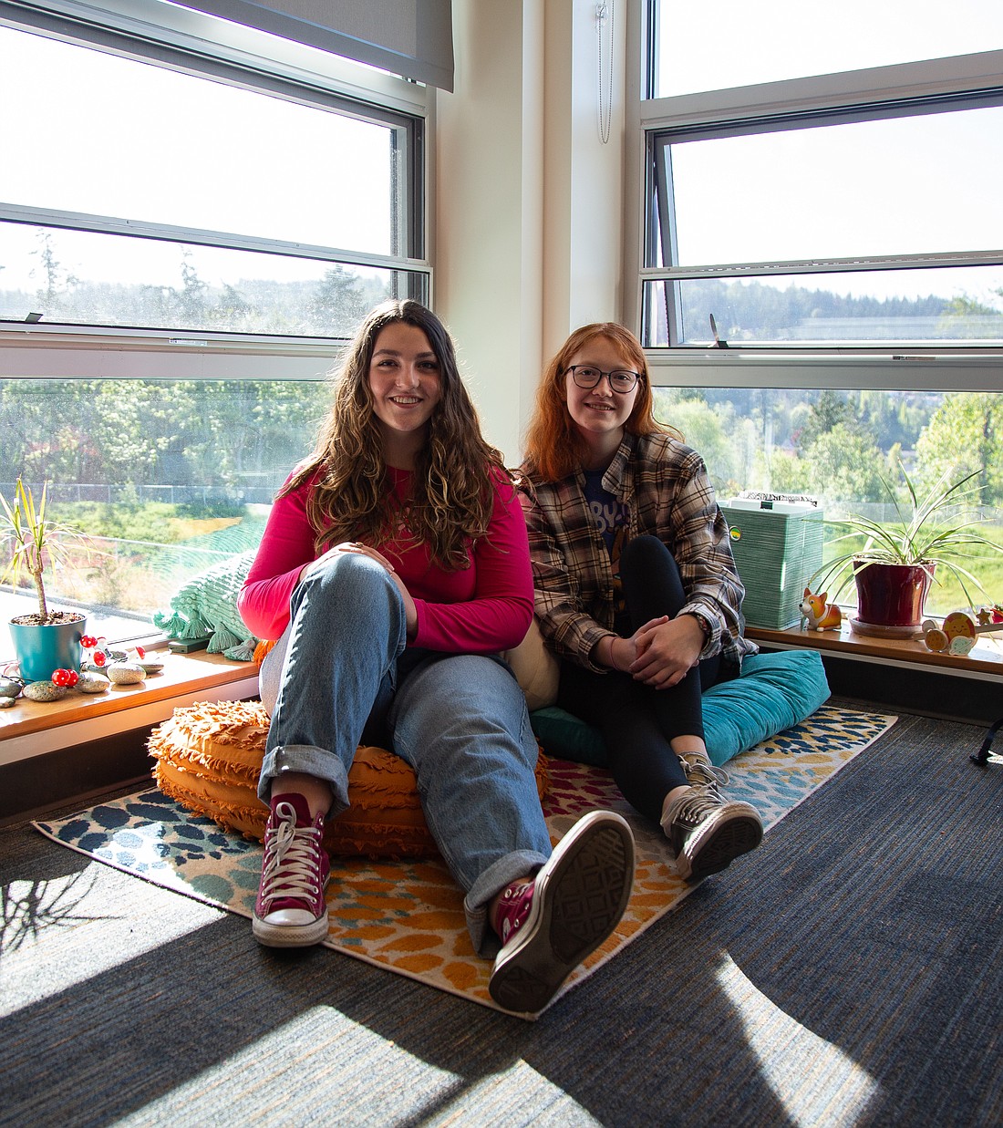 Sehome High School senior Hadley Long, left, and junior Rihanna Johnson are part of the school's Peer Centered Outreach club, aiming to destigmatize mental health and talk about the issues they and other teens face.