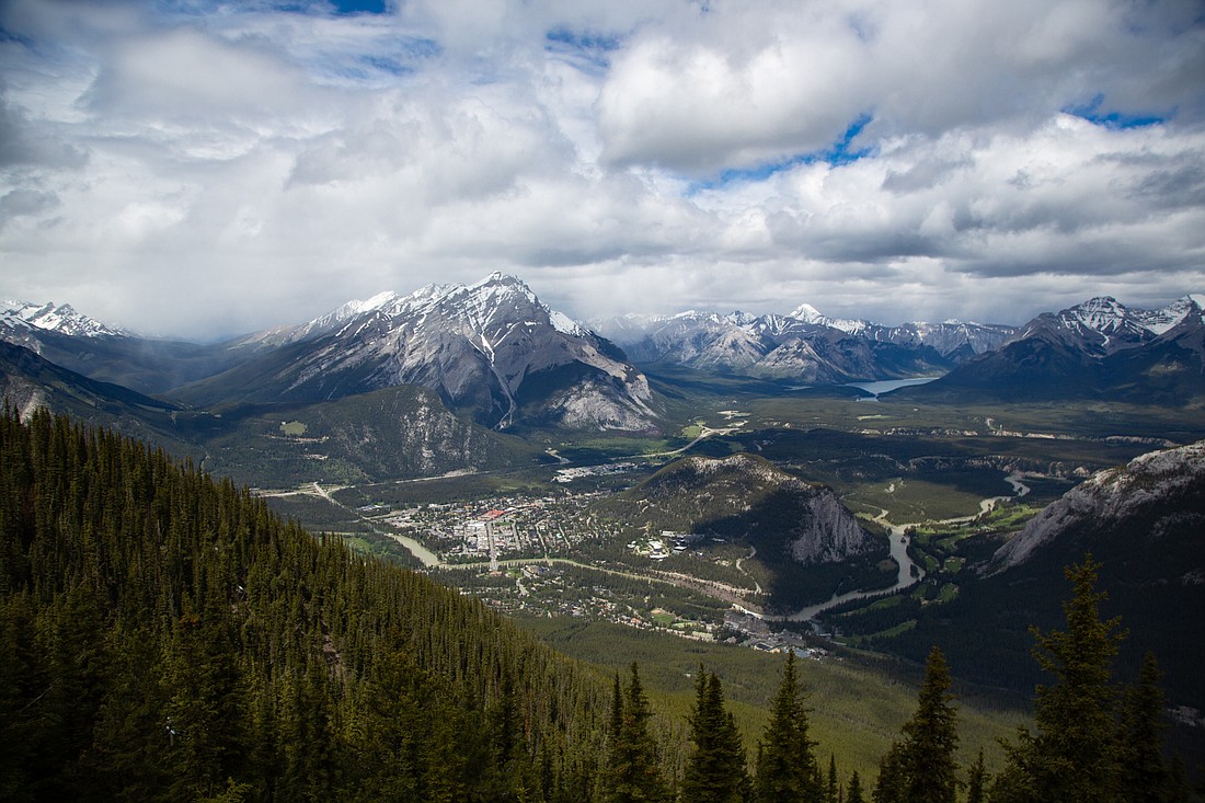 Clouds filter into the Bow River Valley above the town of Banff, Cascade Mountain and Table Mountain as seen from the top of Sulphur Mountain on June 23. Sulphur Mountain is one of the most popular mountain hikes in Banff National Park due to its proximity to the town, its sweeping views and the Banff Gondola that takes many visitors to its peak.