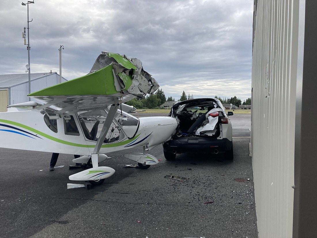 A home-built kit plane lost electrical power and crashed into a building and a car parked at the Anacortes Airport July 4.