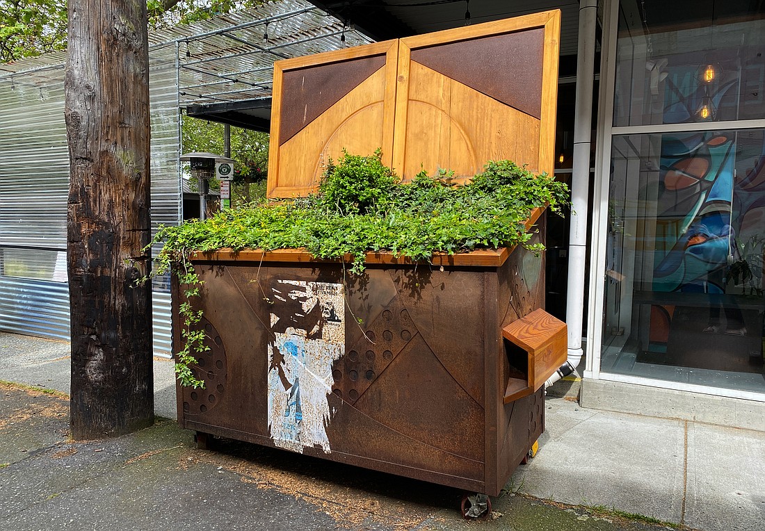 Alex McLean's plant dumpster can be found in the alley next to Locus cafe on Holly Street.