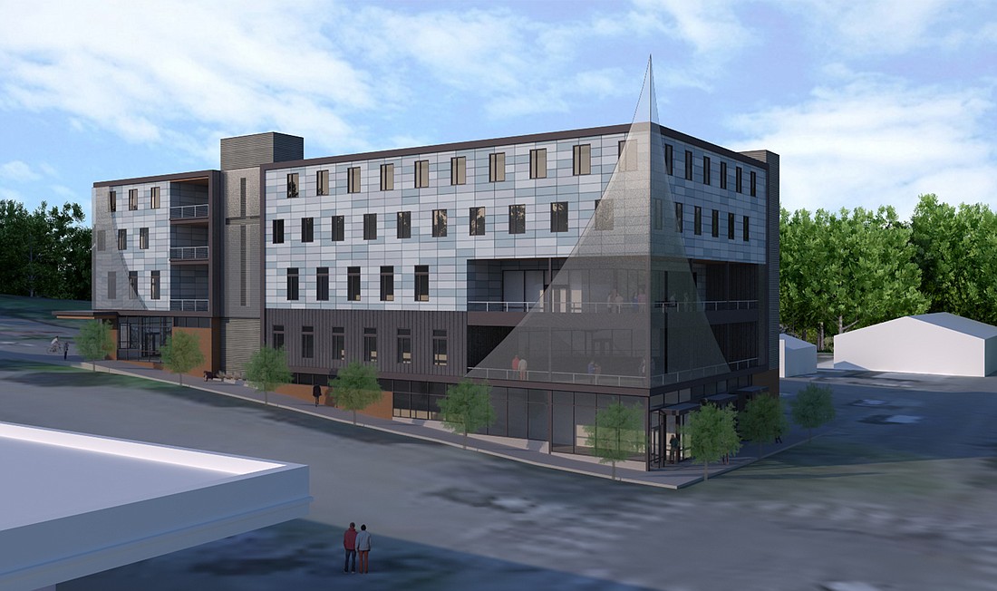 Bellingham's hearing examiner on Wednesday approved Lighthouse Mission Ministries' proposed 300-bed, five-story homeless shelter on Holly Street.