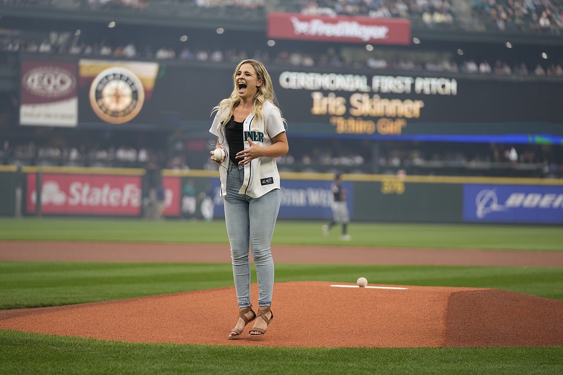 Bellingham resident Iris Skinner prepares to throw out the first pitch of Ichiro Weekend at T-Mobile Park on Aug. 26.