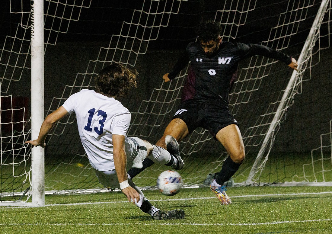 Andrew Rotter takes a shot at the goal after getting past the goalie but a West Texas A&M defenders keeps the ball from scoring late in the second half. The Western Washington University’s men’s soccer game ended in a tie 0-0 on Sept. 1.