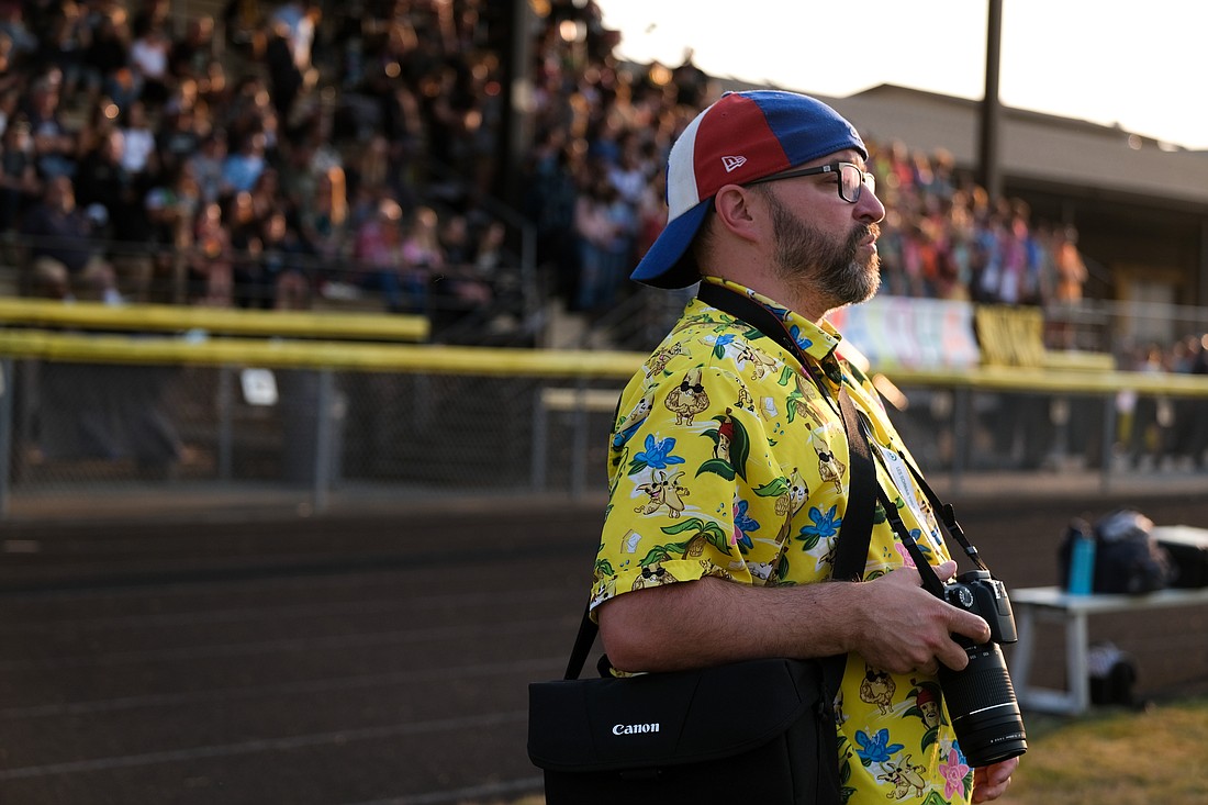 Whatcom Preps owner Tyler Anderson watches from the sidelines of the Meridian-Chelan football game at Meridian High School on Sept. 9.