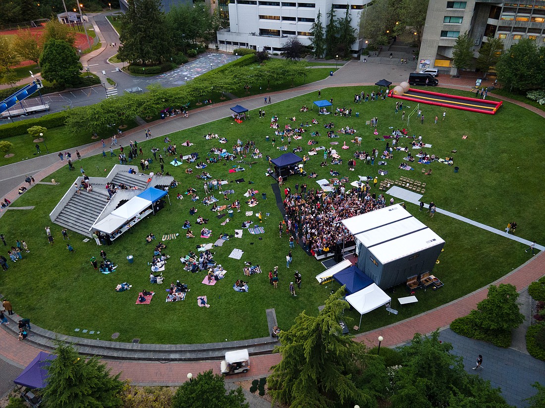 Students cover the lawn and crowd around the stage as the Naked Giants close Lawnstock 2022 at Western Washington University in June. The annual event is put on by Western's Associated Students, who bring music acts to campus throughout the year.