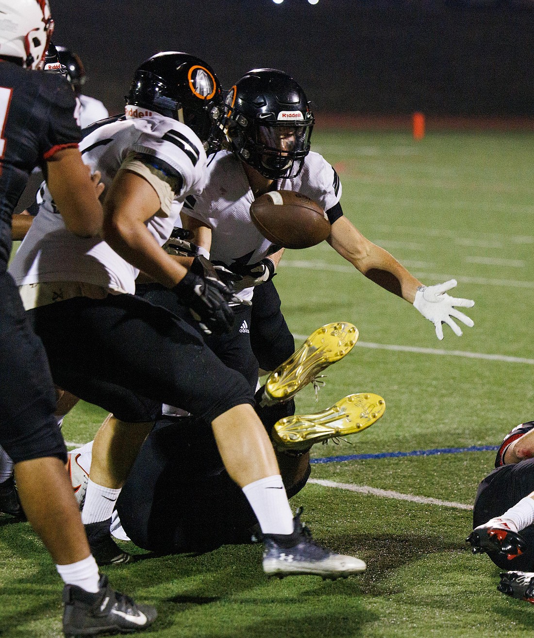 Blaine’s Hunter Vezzetti fumbles and Bellingham recovers the ball in the first quarter. Blaine beat Bellingham 44-18 on Oct. 14.