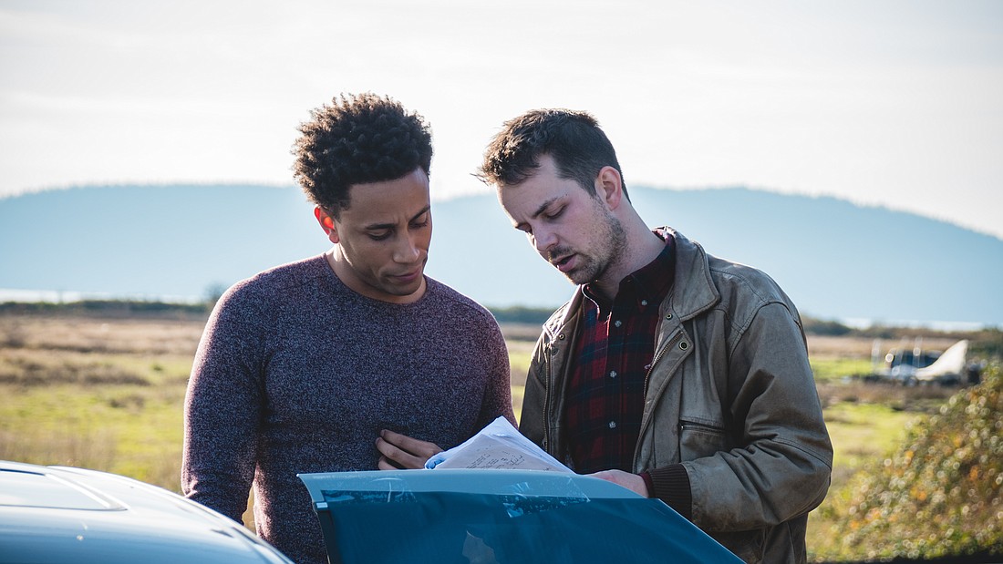 Actor Allen Miller, left, and director Nick Thompson go over the script for “Skagit” while on location in the Skagit Valley in November 2018. The experimental and sometimes abstract horror movie is the only feature-length film showing as part of Bleedingham XI, screening Oct. 28–30 at the Pickford Film Center.