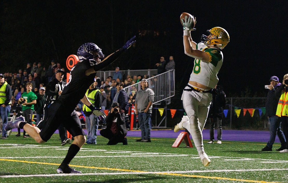 Lynden's Isaiah Stanley hauls in an 18-yard pass for a touchdown to tie the game. Lynden beat Anacortes 23-13 to remain undefeated on Oct. 28.