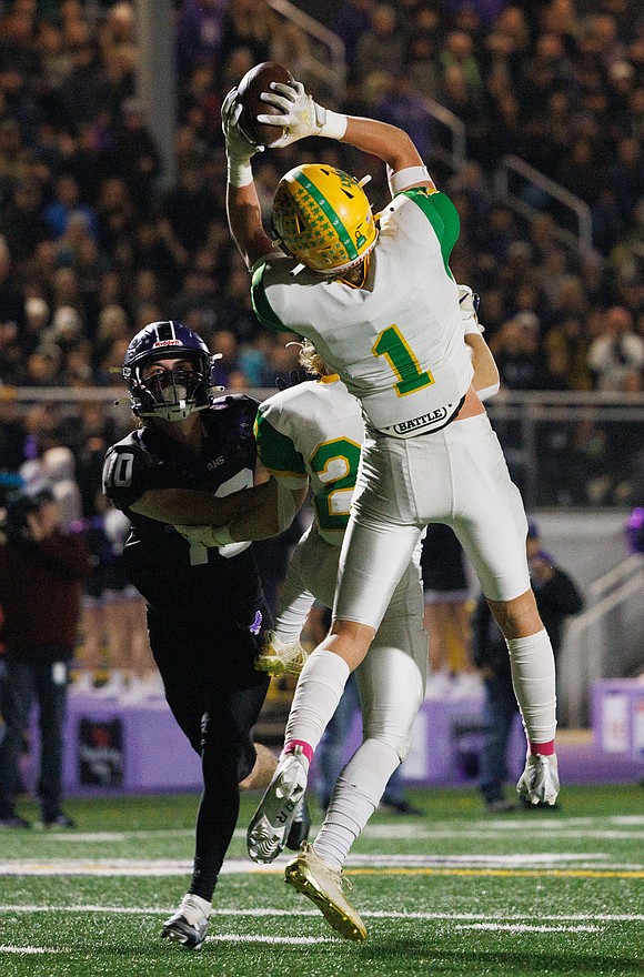 Lynden's Kobe Baar intercepts a pass against Anacortes during a road game on Oct. 28.