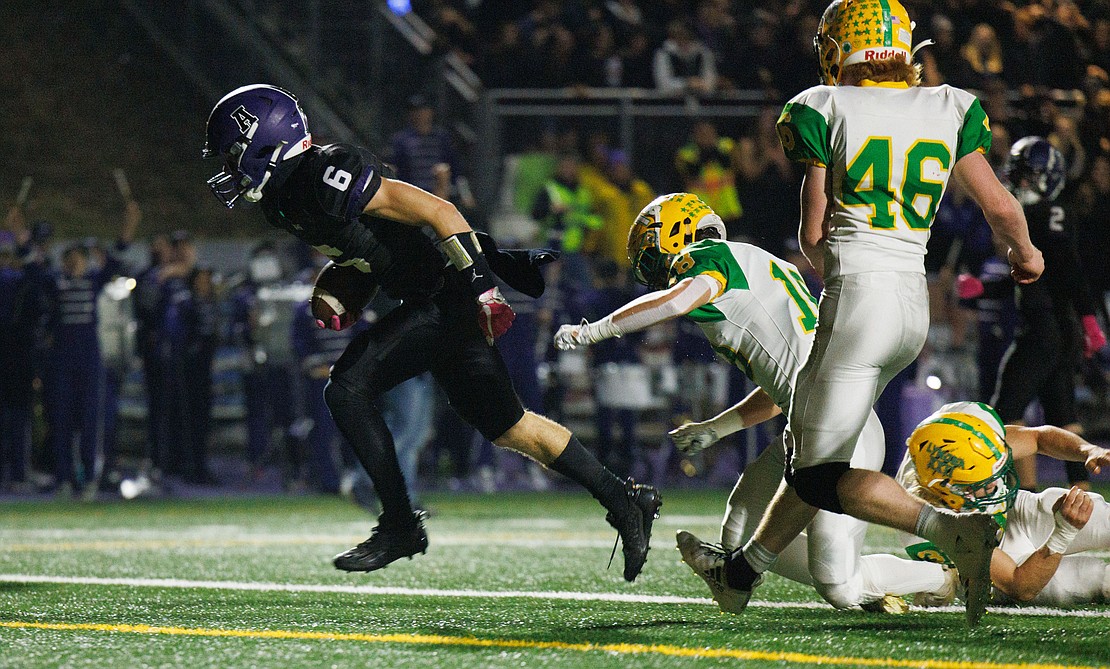 Anacortes running back Brady Beaner rushes in for a touchdown in the first quarter on Oct. 28.