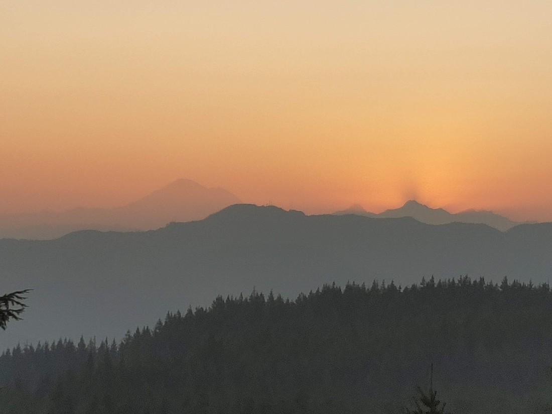 Wildfire smoke covers the North Cascades from the Pine and Cedar Lookout in 2020.