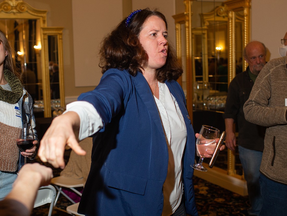 Rep. Sharon Shewmake receives a congratulatory fist bump after finding out the first round of results at Hotel Leo on Nov. 8. Shewmake led over her opponent, Sen. Simon Sefzik, in the race for the 42nd District Senate seat.