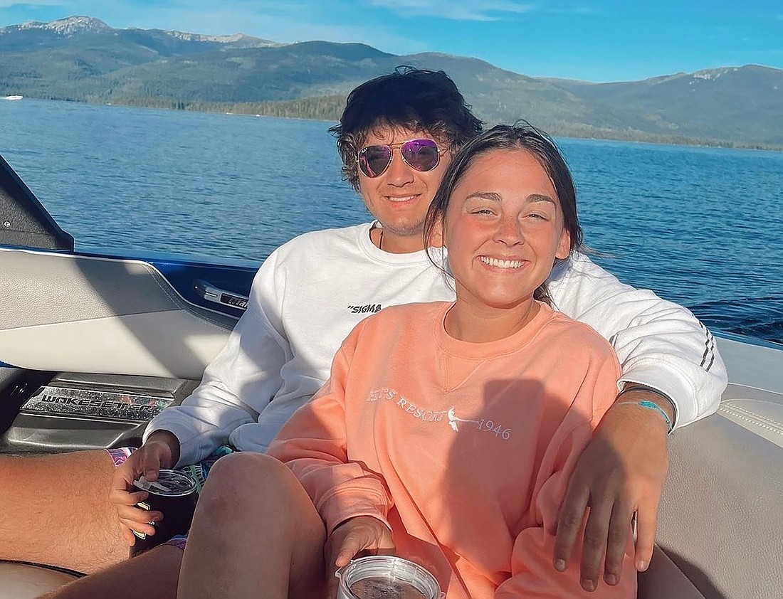 University of Idaho students Ethan Chapin, left, and Xana Kernodle on a boat on Priest Lake, in Idaho, in July 2022. Chapin is from Conway, Skagit County, and both students were among four found stabbed to death in an off-campus rental home on Nov. 13.
