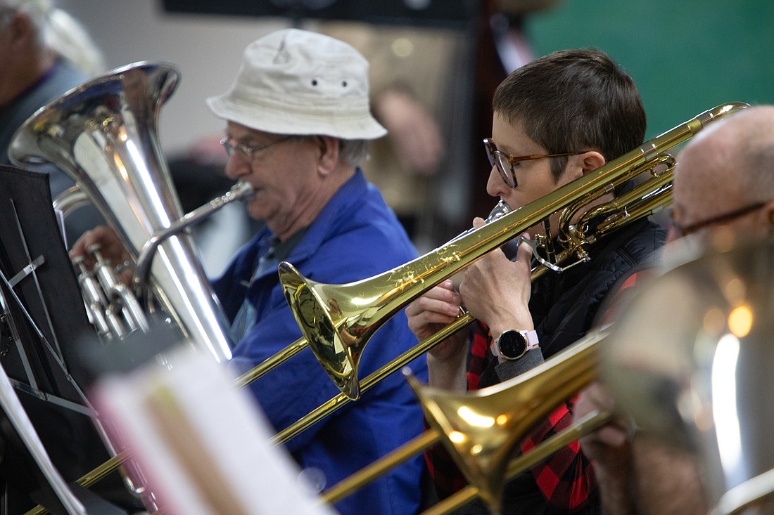 The Bellingham Community Band rehearses Christmas songs and other pieces in the basement of the Central Lutheran Church on Nov. 19.