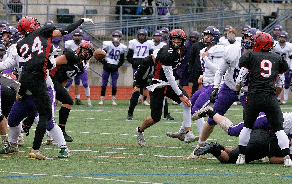 Nooksack Valley's Jorgen Vigre (8) watches his kick get blocked at the end of the game.