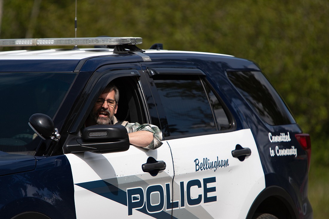 Bellingham City Council member Michael Lilliquist drives a police vehicle in a backing drill in May. Mayor Seth Fleetwood said staffing shortages in the city's police department are not due to a lack of budget, but difficulties recruiting employees.