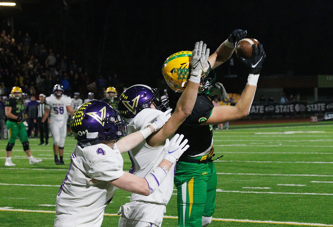 Lynden's Isaiah Stanley hauls in a pass at the 1-yard line late in the fourth quarter to set up the Lions for a go-ahead touchdown.