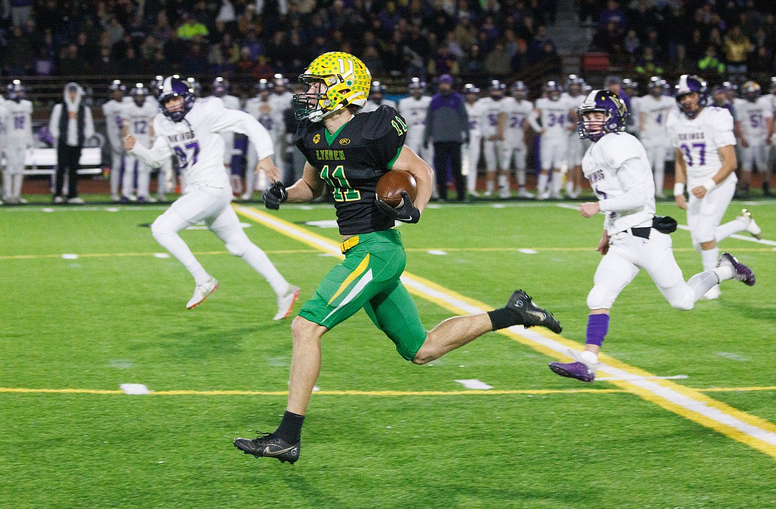 Lynden's Troy Petz turns a blocked field goal into a 65-yard touchdown.