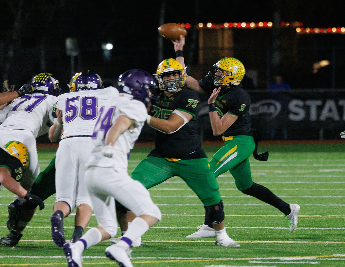 On 4th and 10, Lynden's Brant Heppner throws one of three first-down passes late in the fourth quarter.