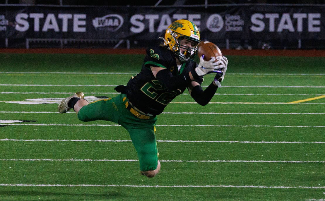 Lynden's Cooper Moore hauls in a pass for a first down.