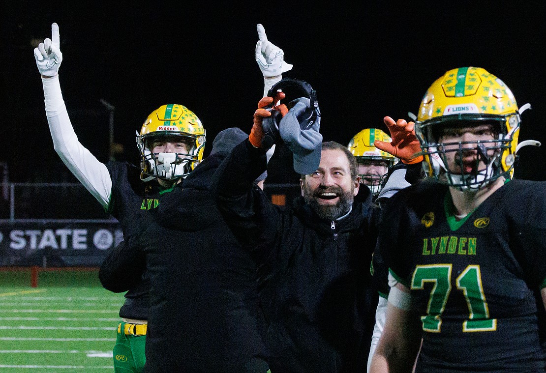 Lynden head coach Blake VanDalen smiles as his team takes the ball with seconds left in the game.