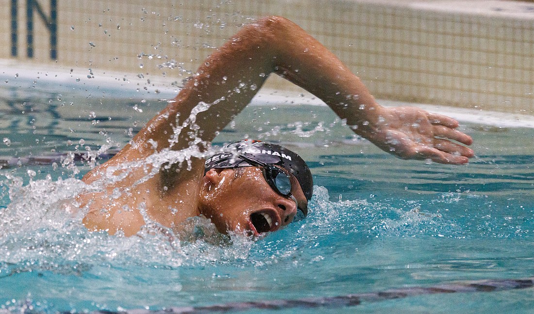 Bellingham's Michael Mosquera takes a breath as he nears the wall in the 200-yard freestyle. Mosquera won as Bellingham and Sehome competed in a meet at Arne Hanna Aquatic Center on Dec. 15.