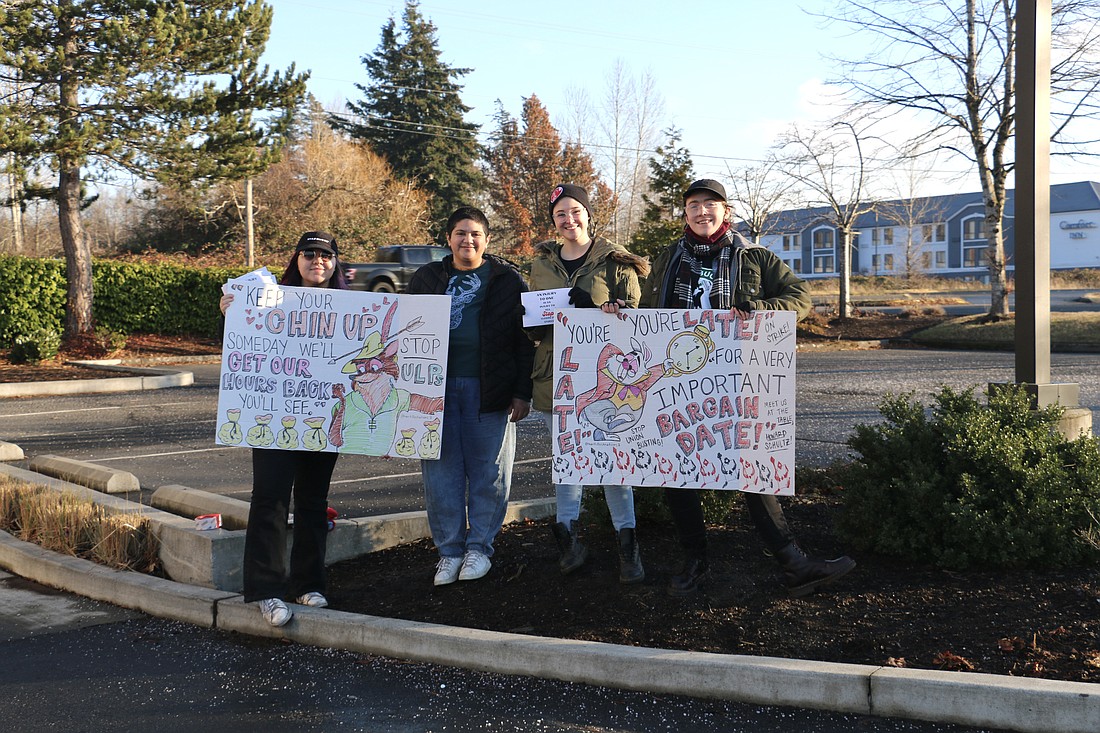 From left, Hanne Yndestad, Alex Ruderman, Sophia Hart and Marlowe Light are four of the thousands of baristas on strike across the country on Dec. 16. They work at the Cordata Center Starbucks, which voted to form a union earlier this year.