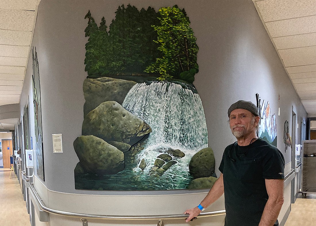 Seventeen paintings by Bellingham-based artist Ron Pattern are on permanent display on the third floor of the surgical recovery ward at PeaceHealth St. Joseph Medical Center. This rendering of Whatcom Falls was created to span the two walls of the exhibit.