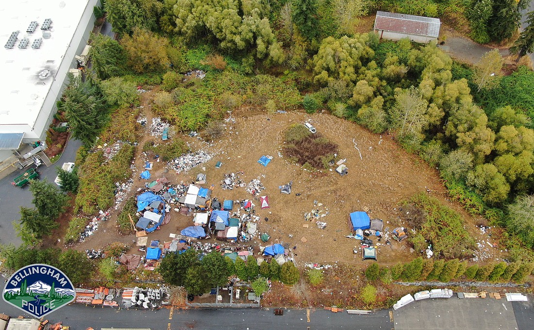 A Bellingham Police Department photo taken on Oct. 25 shows a homeless encampment at 4049 Deemer Road. The piles of garbage have grown larger and more widespread since the photo was taken, Police Lt. Claudia Murphy said.