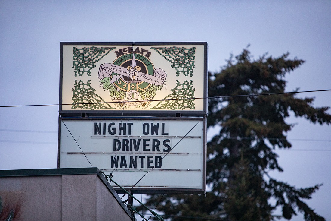 McKay's Taphouse and Pizzeria advertises for late-night delivery drivers. When asked about their hopes and expectations for 2023, business owners shared a common desire for more staffing stability.