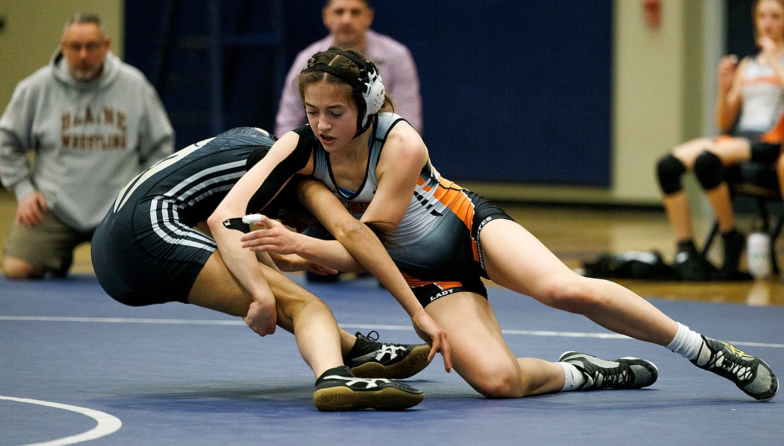 Blaine’s Hailey Ferrell takes down Meridian's Sukpreet Kaur in the final seconds to win the match.