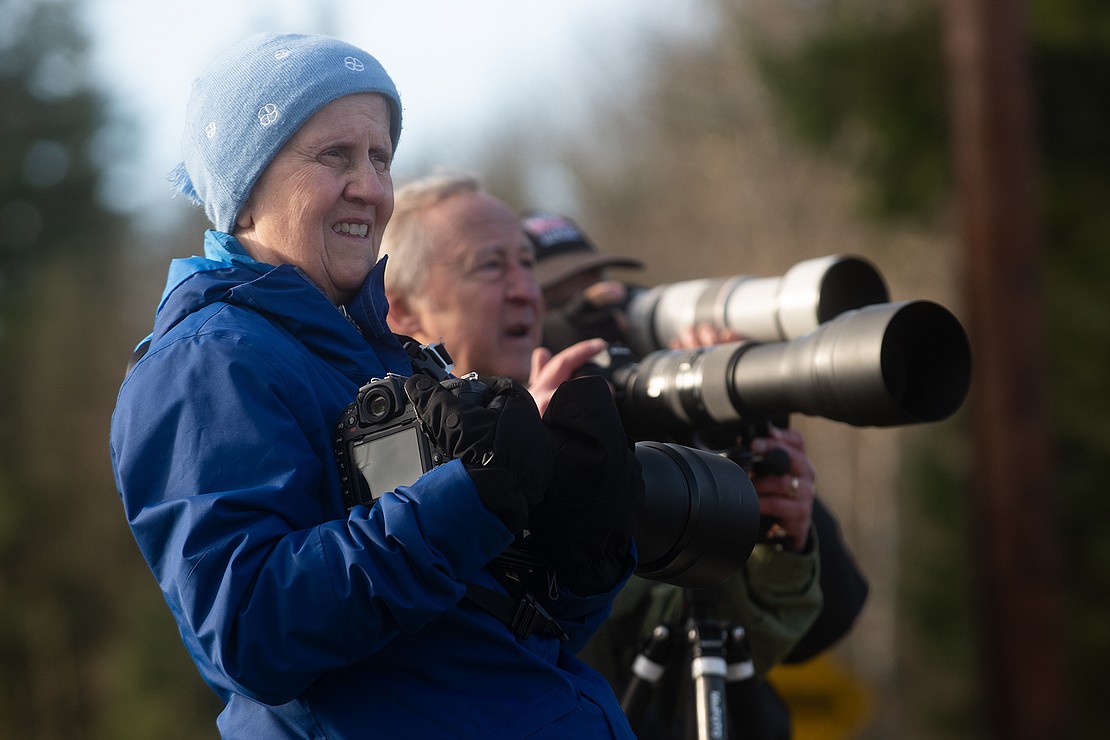 Monica Zaborac waits to photograph an eagle snatching a salmon out of the water along the Nooksack River on Jan. 10. Zaborac makes the trek from Seattle to Deming once a year to photograph the eagles.