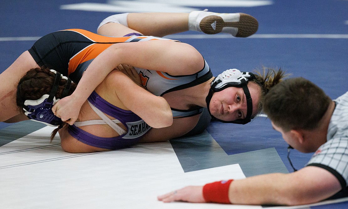 Blaine's Lucyanna Dahl tries to pin her Anacortes opponent.