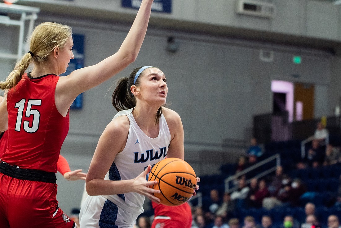 Brooke Walling collects before rising up for a layup against Saint Martin's University on Jan. 12.